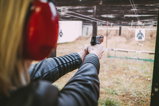 Girl Pointing Gun